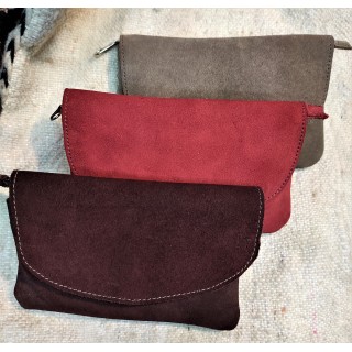 zipped and flapped suede pouch