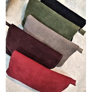 zipped and flapped suede pouch