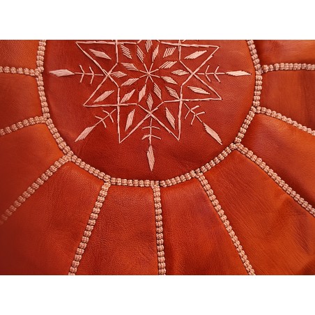 round embroidered leather...